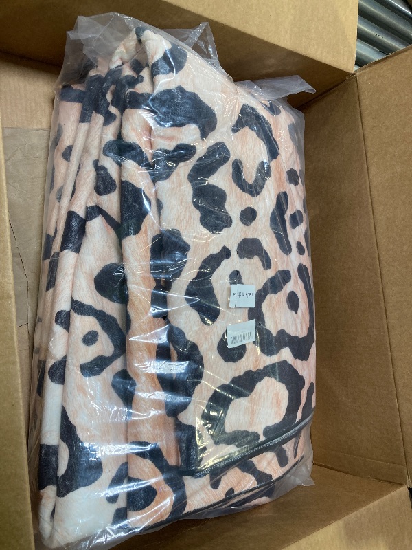 Photo 1 of large oversize room rug. cheetah print for room and office use.