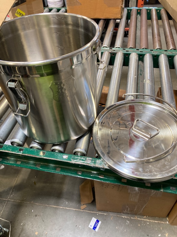 Photo 1 of stainless steel pot secure lid