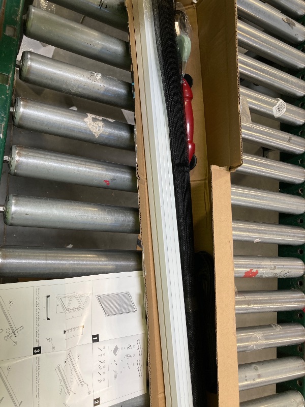 Photo 1 of mesh window replacement kit. 