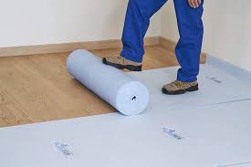 Photo 1 of temporary floor protection roll out blue floor