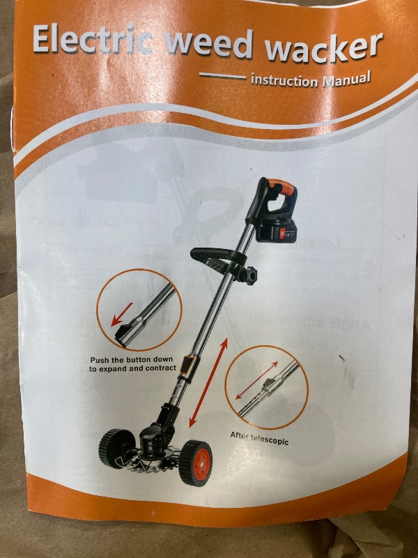 Photo 1 of lithium electric lawn mower weed wacker
