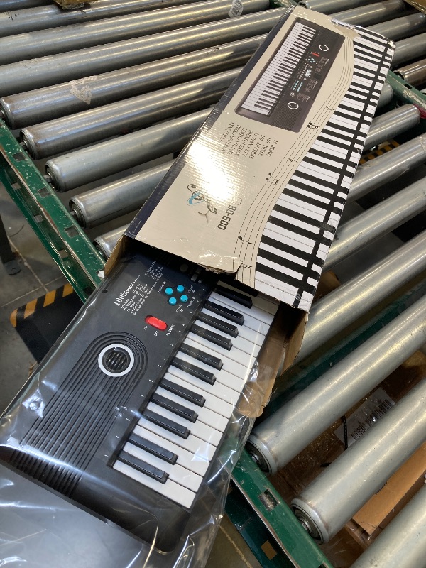 Photo 1 of 61 key keyboard Piano,Portable Electronic Digital Piano,Built In Dual Speakers,External Microphone,Power Plug,Rich Teaching Content,Multi-Functional Electronic Piano Suitable For Beginners Black