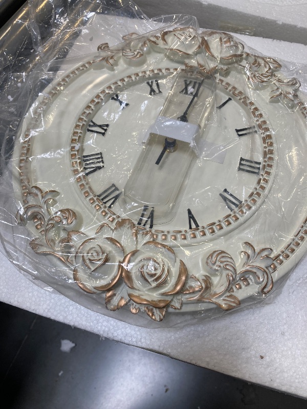 Photo 1 of European Style Resin Wall Clock, Retro Silent Clock with Rose Relief, Decorative Mural Clock for Living Room, Bedroom, Office, Farmhouse, Kitchen & Home Decor (White, 12.2 * 1.7 * 11.4in) 