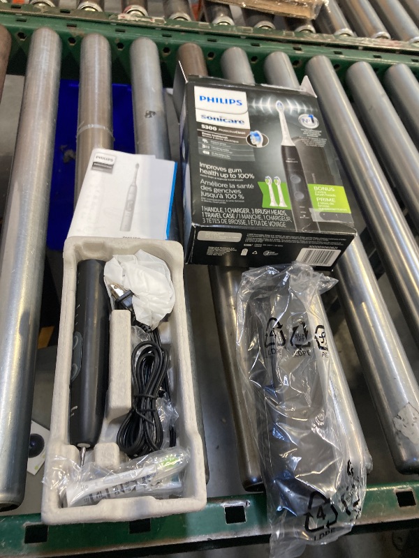 Photo 1 of Philips Sonicare ProtectiveClean 5300 Rechargeable Electric Toothbrush, with Pressure Sensor, 3 Cleaning Modes, SmarTimer and QuadPacer, with 2 Bonus Brush Heads, Travel Case, Black, Model HX6423/34