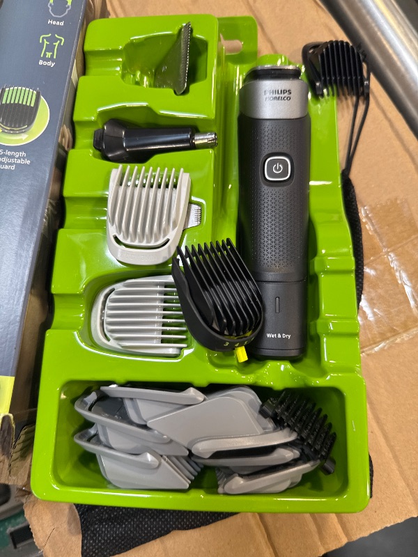 Photo 1 of Philips Norelco Multigroom Series 5000 18 Piece, Beard Face, Hair, Body and Intimate Hair Trimmer for Men - NO BLADE OIL MG5910/49