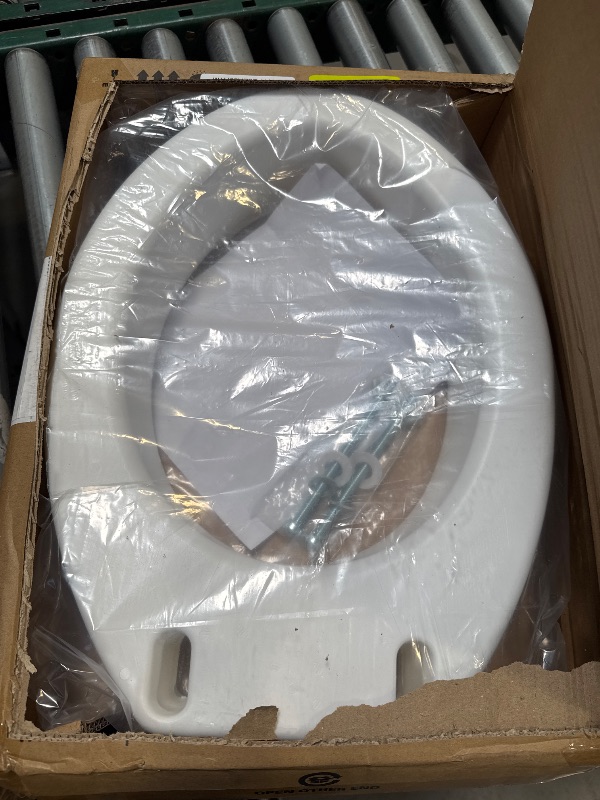 Photo 1 of Carex Toilet Seat Riser, Elongated Raised Toilet Seat Adds 3.5 inches to Toilet Height, for Assistance Bending or Sitting, 300 Pound Weight Capacity Toilet Riser