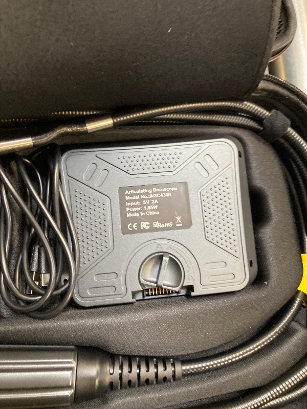 Photo 1 of DXZtoz 10FT Articulating Borescope, Inspection Camera with 0.33in Two-Way Steering Snake Camera, Waterproof 1080P Endoscope with Light for Mechanics Electriction Wall Pipe Inspection