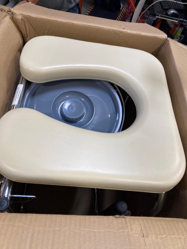 Photo 1 of Guardian Padded Drop Arm Commode