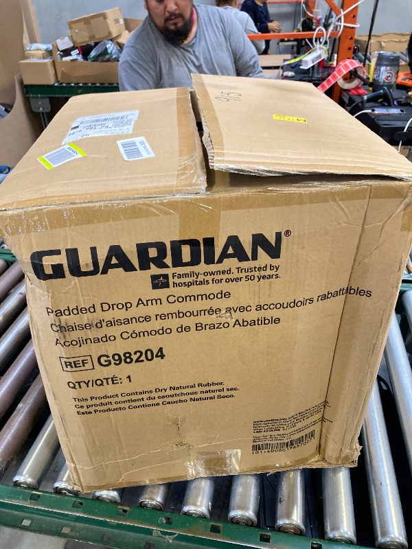Photo 1 of Guardian Padded Drop Arm Commode