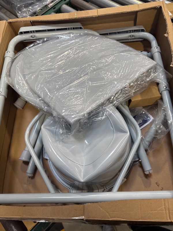 Photo 1 of Drive Medical 11148-1 Folding Steel Bedside Commode Chair, Portable Toilet, Supports Individuals Weighing Up To 350 Lbs, with 7.5 Qt. Bucket and 13.5 Inch Seat, Grey