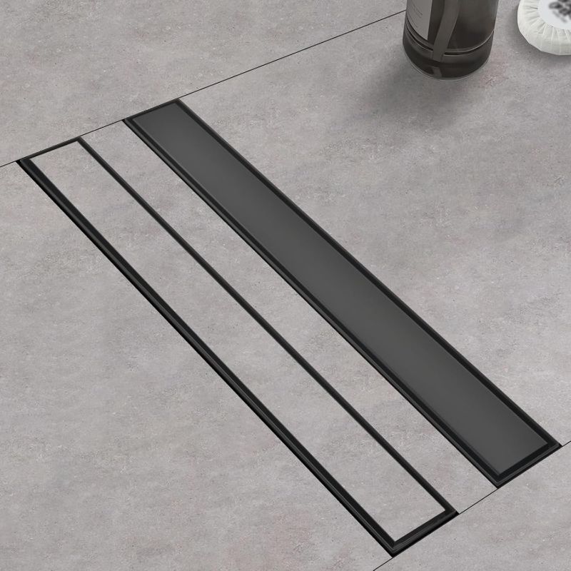 Photo 1 of Linear Shower Drain with Tile Insert Panels, 24 Inch Black 304 Stainless Steel Rectangle Shower Floor Drain, with Hair Catcher, Adjustable Feet, Fits Bathroom, Balcony
