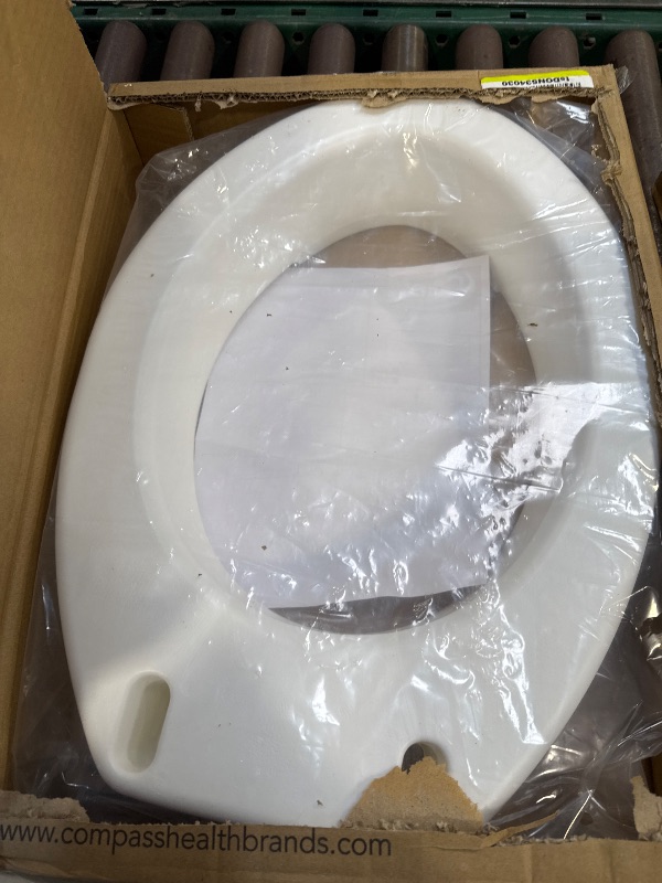 Photo 1 of Carex Toilet Seat Riser, Elongated Raised Toilet Seat Adds 3.5 inches to Toilet Height, for Assistance Bending or Sitting, 300 Pound Weight Capacity Toilet Riser