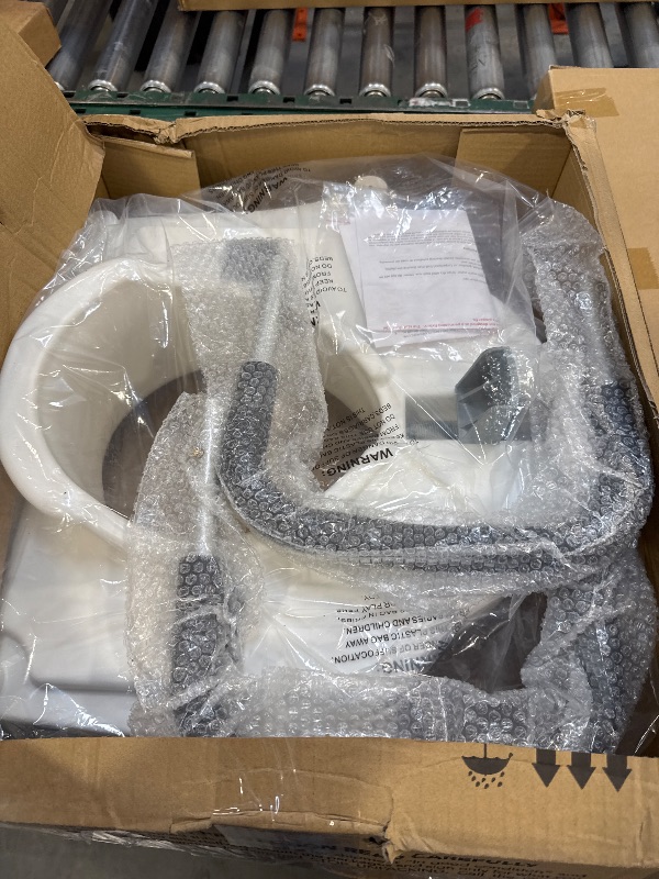 Photo 1 of Vaunn Raised Toilet Seat and Elevated Commode Booster Seat Riser with Removable Padded Grab Bar Handles & Locking Mechanism