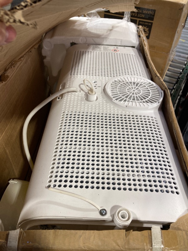 Photo 1 of FOHERE 12000 BTU Portable Air Conditioner for Room and Heater up to 450 Sq.Ft, 4 IN 1 All Season AC Portable Air Conditioner with Remote Control and Window Kit Includ