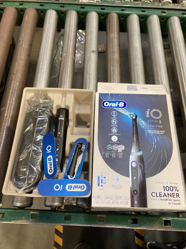 Photo 1 of Oral-B iO Deep Clean + Whiten Rechargeable Electric Toothbrush with Visible Pressure Sensor, 2 Minute Timer, 5 Cleaning Settings, 1 iO5 Limited, 3 Toothbrush Heads, Travel Case & Refill Holder, Black