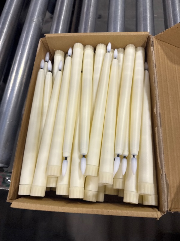 Photo 1 of Baquler 50 Pcs Flameless Ivory Taper Candles Bulk Flickering LED Candles Taper Warm White Light LED Candlesticks for Christmas Wedding Home Decoration No Remote Control, 9.6 Inch
