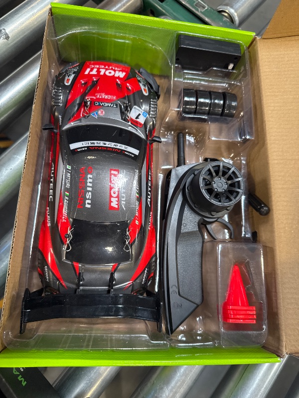 Photo 1 of HTURCCOP 1:16 RC Drift Car 2.4GHz Spray 4WD LED Lights 30+KM/H High Speed Remote Control Car 2 Batteries 60Min Infinitely Variable Speed Drift Car Toys for Adults and Kids(Red)