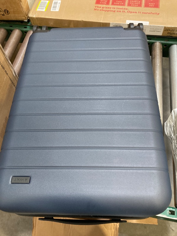 Photo 1 of Away Bigger Carry-On Luggage, Lightweight Hardside Large Suitcase with Spinner Wheels, TSA Lock, Airline Approved, Navy Blue