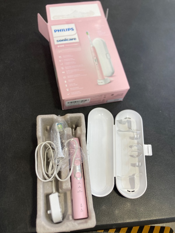 Photo 1 of Philips Sonicare ProtectiveClean 6100 Rechargeable Electric Toothbrush, with Pressure Sensor, 3 Cleaning Modes, SmarTimer and QuadPacer, 14-Day Battery Life, Travel Case, Pink, Model HX6876/21