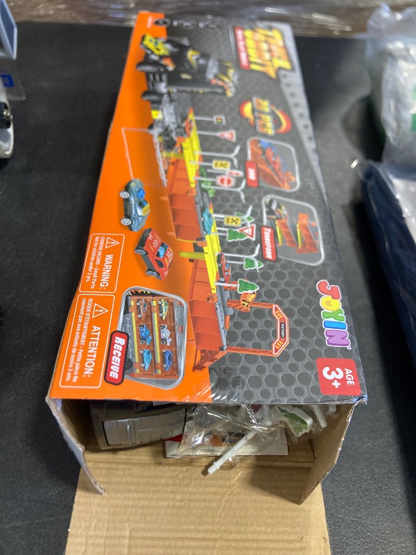 Photo 1 of JOYIN Toy Truck for Kids, Race Toy Cars, 60" Extra Long Race Track and 12 Die-Cast Metal Cars, Toddler Carrier Truck Playset with Lights & Sounds, Birthday Gift for 2 3 4 5 6 7 Years Old Boys Girls