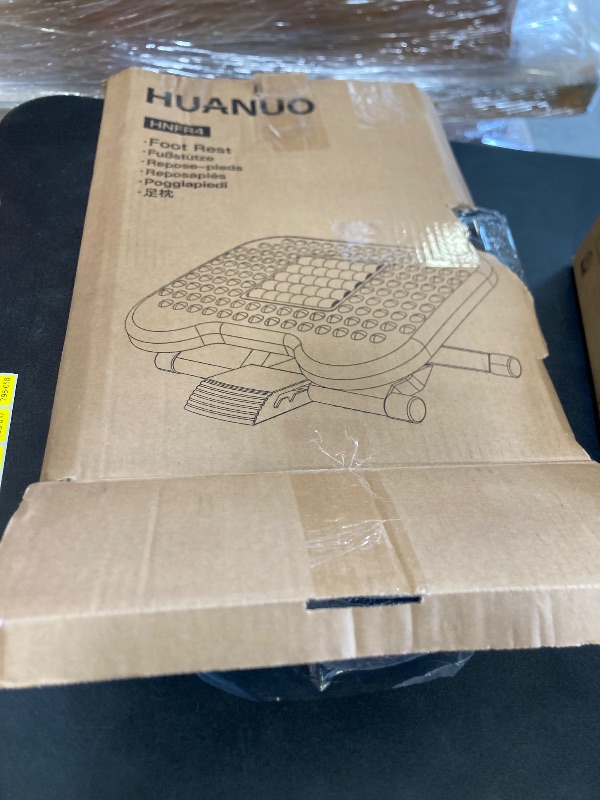 Photo 1 of HUANUO Foot Rest for Under Desk at Work, Adjustable Footrest with Massage Texture and Roller, Ergonomic Foot Stool with 3 Height Position, 30 Degree Tilt Angle Adjustment for Home, Office