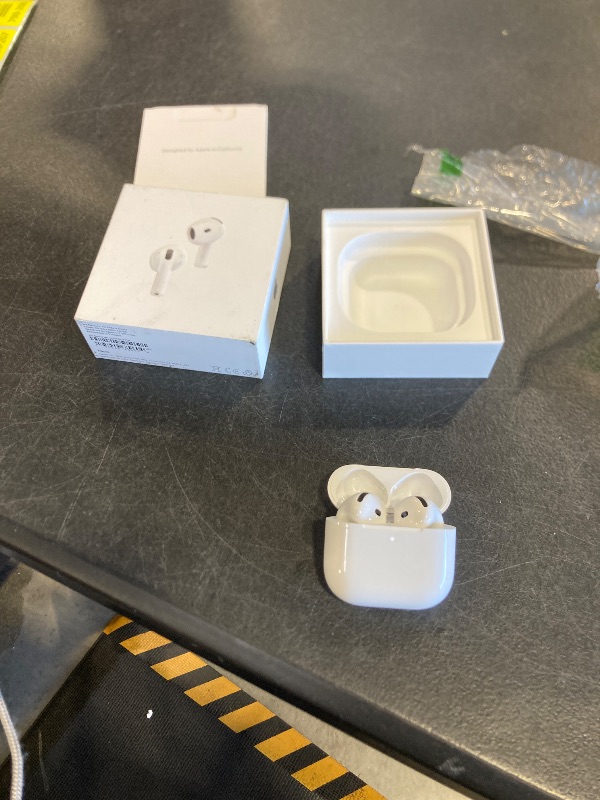 Photo 1 of Apple AirPods 4 Wireless Earbuds, Bluetooth Headphones, with Active Noise Cancellation, Adaptive Audio, Transparency Mode, Personalized Spatial Audio, USB-C Charging Case, Wireless Charging, H2 Chip