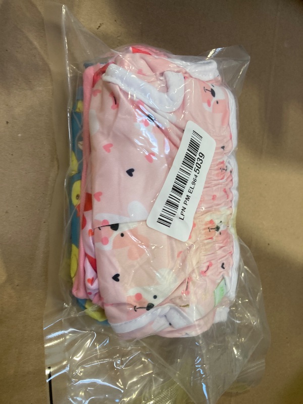 Photo 1 of wegreeco Washable Female Dog Diapers Highly Absorbent Reusable Diapers for Dog in Heat Period, 3 Pack (Yellow Ducks, Medium)