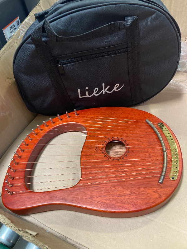Photo 1 of LIEKE Lyre Harp 16 Strings with Bag Tuning Wrench,Metal Strings,Mahogany Body and Copper Saddle,Professional Lyre Harp instrument Gift for Beginner Musician