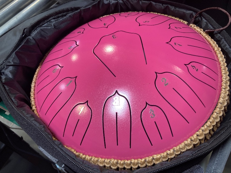 Photo 1 of Steel Tongue Drum 12 Inch 15 Notes: Handpan Drums Set with Music Book Mallets Carry Bag - Hand Pan Instrument for Adults Musical Education Meditation Yoga Chakra(Pink)