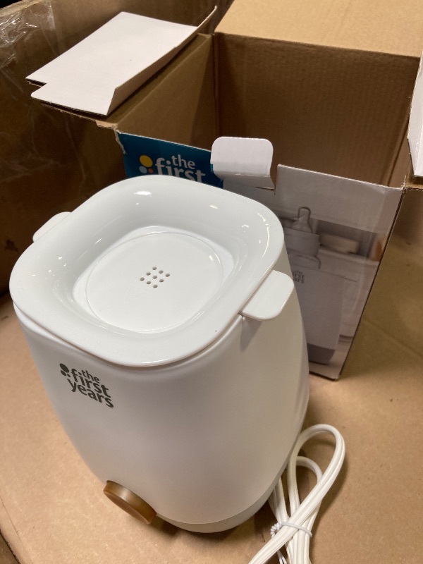 Photo 1 of The First Years Baby Bottle Warmer and Sterilizer - Pacifier and Bottle Nipple Sanitizer - Feeding Baby Essentials for Formula or Breast Milk - Holds Multiple Sizes