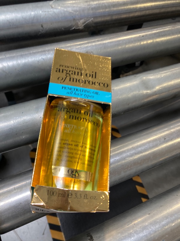 Photo 1 of OGX Renewing + Argan Oil of Morocco, Penetrating Hair Oil Treatment, Moisturizing & Strengthening Silky Oil for All Hair Types, Formulated without Parabens & Sulfated Surfactants, 3.3 Fl Oz
