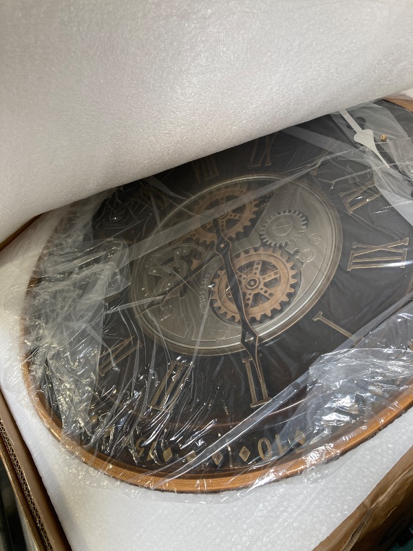 Photo 1 of CLXEAST 24 Inch Wall Clock with Moving Gears,Oversized Large Industrial Steampunk Clock, Antique Gold Metal Roman Numeral Wall Clocks for Farmhouse Living Room Decor