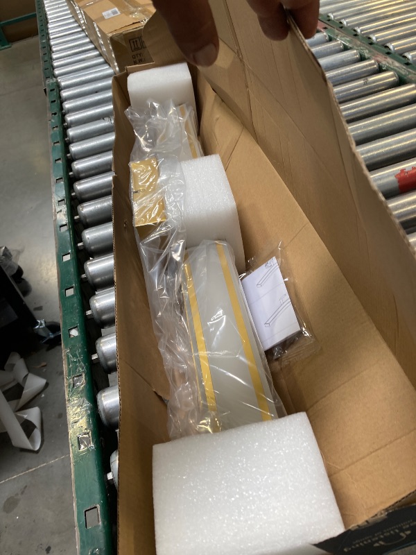 Photo 1 of ITEM IS MISSING PARTS, UNSURE WHAT PARTS ARE MISSING -------------------------------------------31.2 gold Trim LED bathroom or vanity light 