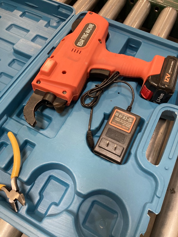 Photo 1 of Futchoy 8mm-34mm Tier Tying Machine Automatic Rebar Tier Tying Machine Electric Reinforcing Rebar Tier Gun (Orange)