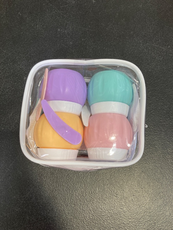 Photo 1 of Travel Containers for Toiletries, GLAMFIELDS TSA Approved 1.7oz 50ml Travel Size Silicone Cream Jars BPA Free, Leak-proof Travel Essentials with Lid for Cosmetic Face Hand Body Cream Macaron (4 Pack)