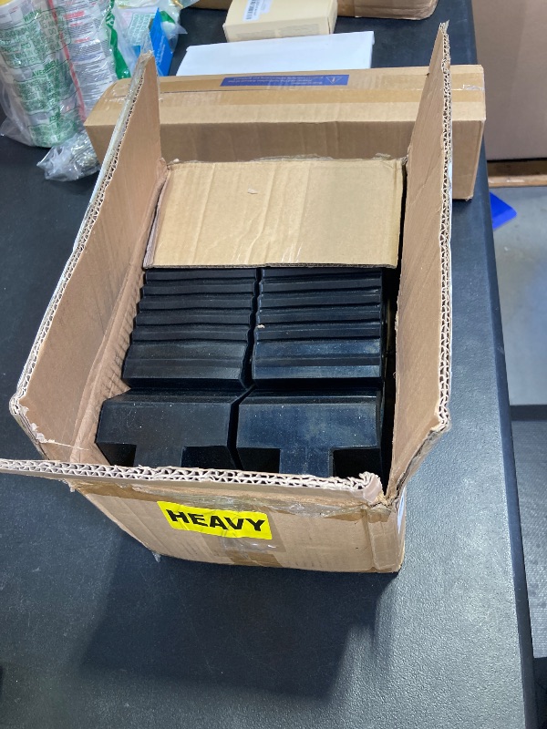 Photo 1 of HOXWELL Solid Heavy Duty Rubber Wheel Chocks 4 Packs, Premium Wheel Stopper for Car, Travel Trailers, RV, Truck, and ATV(4 pcs, Black) 8" x 4" x 6"