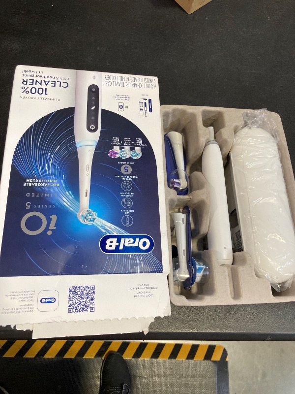 Photo 1 of Oral-B iO Deep Clean + Whiten Rechargeable Electric Toothbrush with Visible Pressure Sensor, 2 Minute Timer, 5 Cleaning Settings, 1 iO5 Limited, 3 Toothbrush Heads, Travel Case & Refill Holder, White