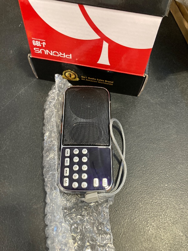Photo 1 of PRUNUS J-189 Bluetooth AM FM Radio, Small Portable Radios - Dual Speaker Heavy Bass, LED Flashlight, Pocket Size, TF Card USB AUX MP3 Player, Rechargeable Battery Operated Small Radio(Black)
