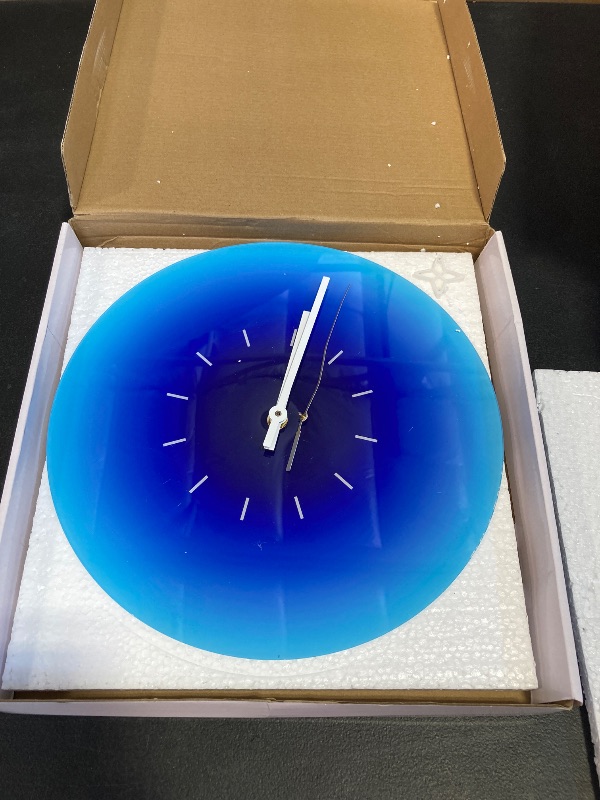 Photo 1 of VOSAREA Acrylic Wall Clock Round Tabletop Clock Sunset Wall Clock Battery Operated Blue Ocean Wall Clock Decorative Hanging Clock Silent Non-Ticking Wall Clock for Home (11.79X11.79X0.08in)