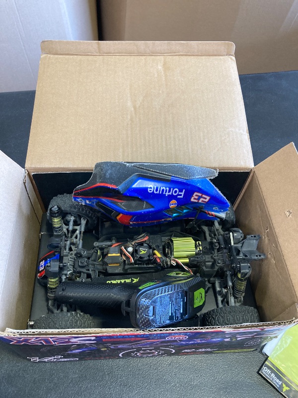 Photo 1 of VIRCAS 1/12 Brushelss RC Cars for Adult Top Speed 50+ MPH RC Buggy All Terrain RC Truck 4W Off-Road Monster Trucks Waterproof Remote Control Car with 3S Battery (Blue) PARTS ONLY, NO RETURNS ON ITEM 