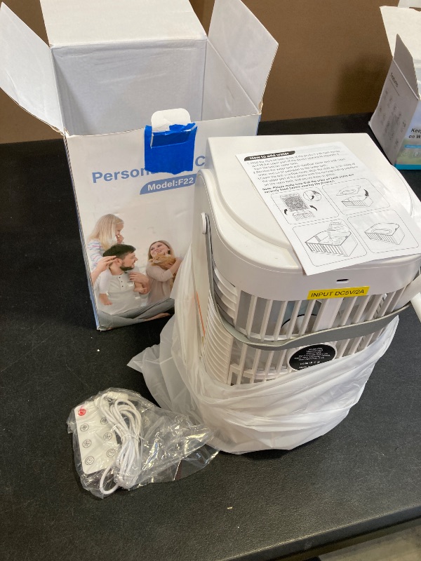 Photo 1 of AI Portable Air Conditioners Fan,JYew Evaporative Mini Room Air Conditioners,3 Speed AC Portable for Room with 1500ML, Portable AC Unit Air Cooler with 4 in 1 Humidifier Fan Conditioner (White)