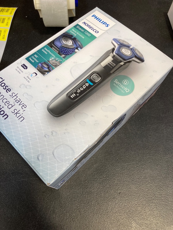Photo 1 of Philips Norelco Shaver 7200, Rechargeable Wet & Dry Electric Shaver with SenseIQ Technology and Pop-up Trimmer, S7887/82
