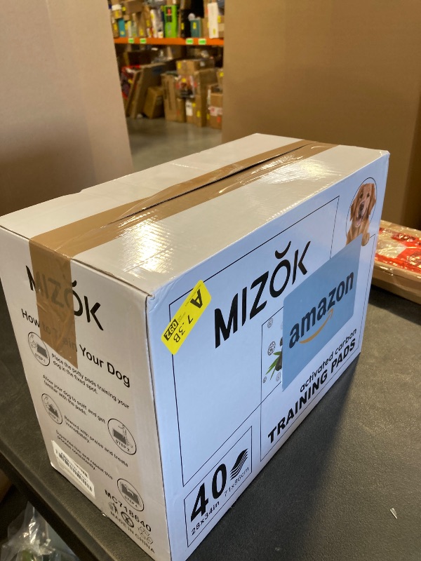 Photo 1 of MIZOK Pee Pads for Dogs - Large 28x34 Inches, Charcoal Puppy Pads, Absorbs Up to 8 Cups of Urine, 6-Layer Leak-Proof Wee Wee Pads (40 Counts)