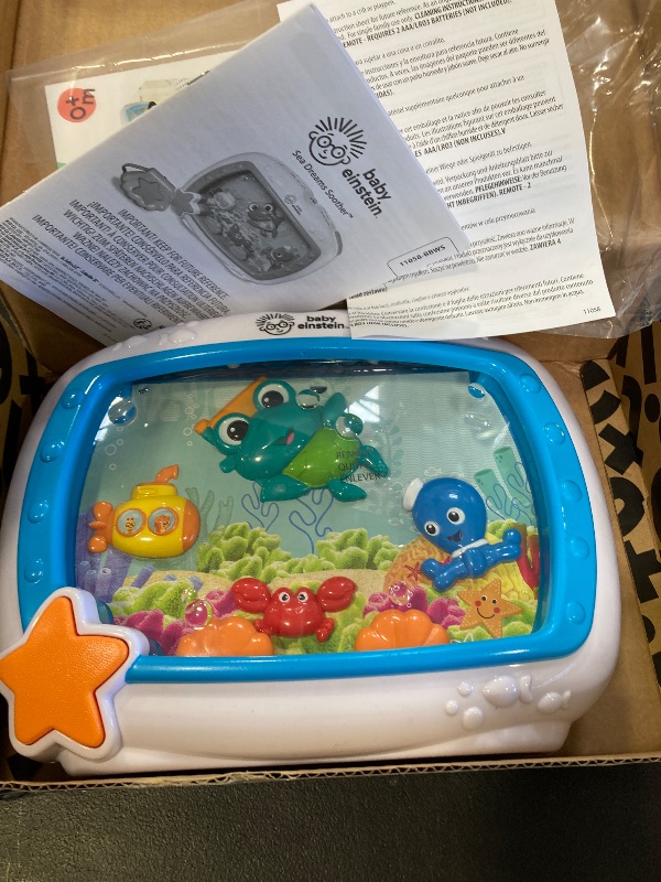 Photo 1 of Baby Einstein Sea Dreams Soother Musical Crib Toy and Sound Machine, Newborn and up