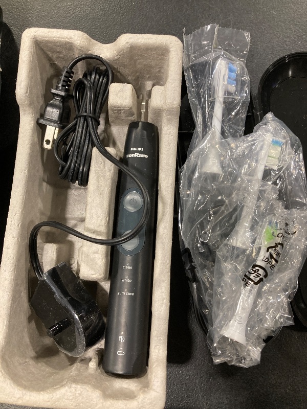 Photo 1 of Philips Sonicare ProtectiveClean 5300 Rechargeable Electric Toothbrush, with Pressure Sensor, 3 Cleaning Modes, SmarTimer and QuadPacer, with 2 Bonus Brush Heads, Travel Case, Black, Model HX6423/34