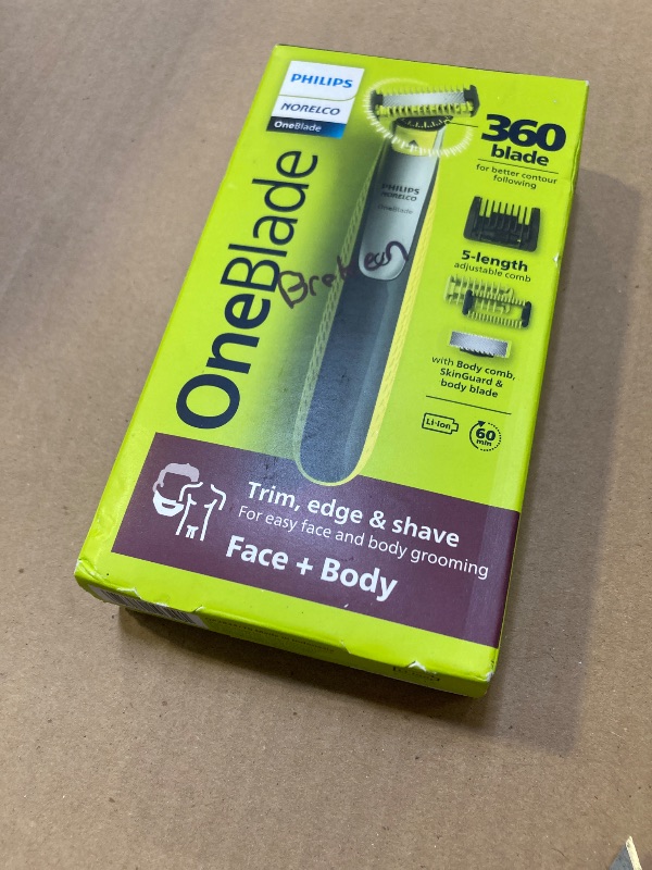 Photo 1 of Philips Norelco OneBlade 360 Hybrid Blade for Face + Body, Electric Beard Trimmer, Shaver and Groomer, with 360 Blade Technology, 5in1 Adjustable Comb, 1x Body Kit, Model QP2834/70, Black/Lime Green