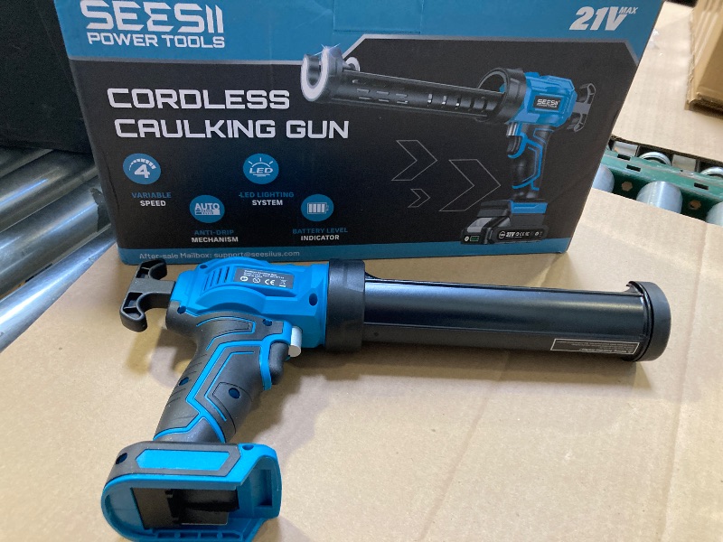 Photo 1 of SEESII Cordless Caulking Gun, 21V Battery Powered Caulk Gun, Electric Caulking Gun w/2 x 2.0Ah Batteries, 9Pcs Caulk Remover Tool, LED Light, Auto Retract for Filling, Sealing (Blue)