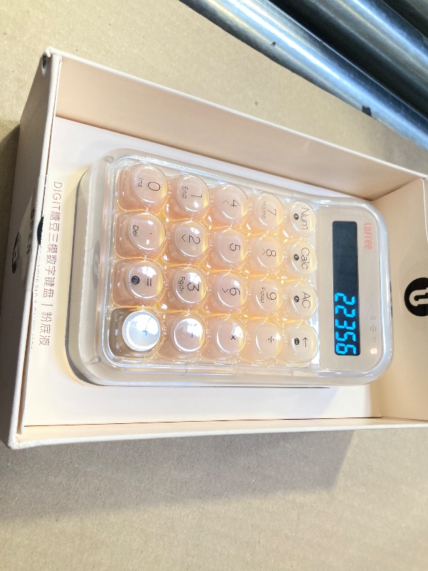 Photo 1 of LOFREE Foundation Tri-Mode Wireless Numpad White LED Backlight Compatible with MacOS, iOS, Windows, and Android