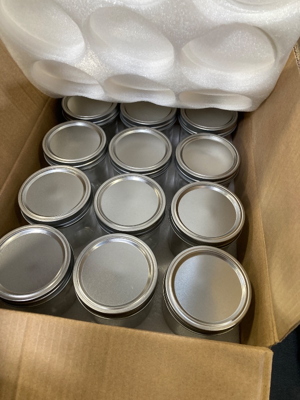 Photo 1 of Yodecy 12 Pack 16 oz Wide Mouth Clear Mason Jars with Silver Metal Lids, Canning Jars for Overnight Oats, Food Storage, Dry Food, Snacks, Candies and More