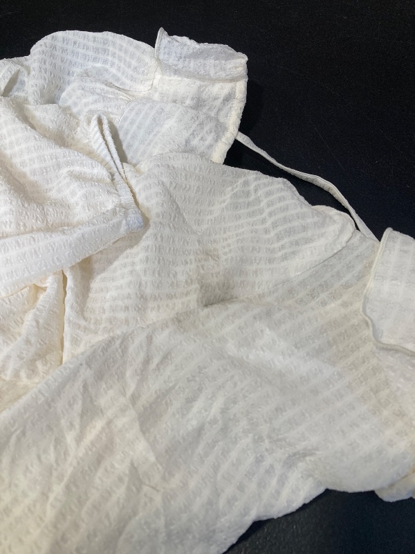 Photo 1 of SIZE MEDIUM- WOMENS IVORY RUFFLED TOP